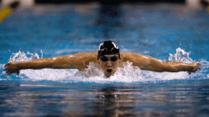 The World famous Michael Phelps shows good form in this picture. Chin on the water to breathe, arms carried laterally over the water with little finger on the top and thumb just brushing the surface.